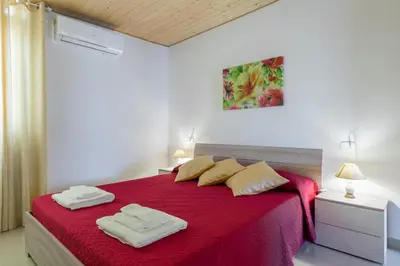 Letto o letti in una camera di Sasha's
