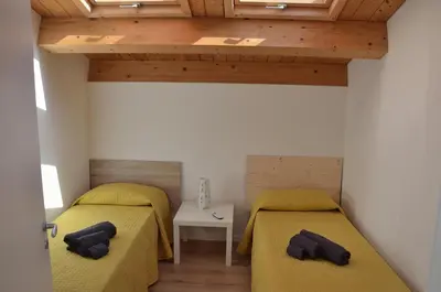 Letto o letti in una camera di Eleven