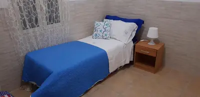 Letto o letti in una camera di Soluzionestate