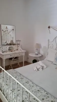 Letto o letti in una camera di Soluzionestate