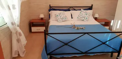 Letto o letti in una camera di Soluzionestate