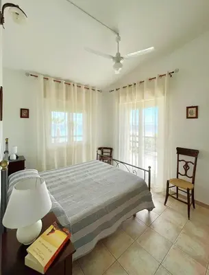 Letto o letti in una camera di Tra Cielo e Mare - San Lorenzo