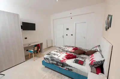 Letto o letti in una camera di B&B Epipoli