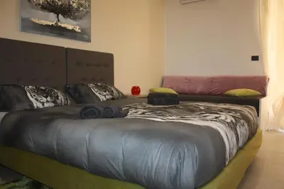 Letto o letti in una camera di B&B Epipoli
