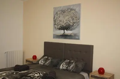 Letto o letti in una camera di B&B Epipoli