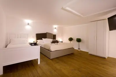 Letto o letti in una camera di Le Suites Del Duomo House