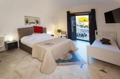 Letto o letti in una camera di Le Suites Del Duomo House