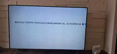 TV o dispositivi per l'intrattenimento presso Bilocale fronte spiaggia a Marzamemi