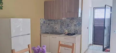 Cucina o angolo cottura di Bilocale fronte spiaggia a Marzamemi