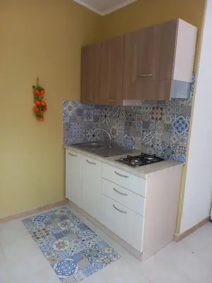 Cucina o angolo cottura di Bilocale fronte spiaggia a Marzamemi