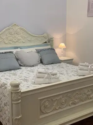 Letto o letti in una camera di Zá ‘Ntunietta