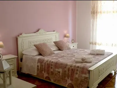 Letto o letti in una camera di Zá ‘Ntunietta