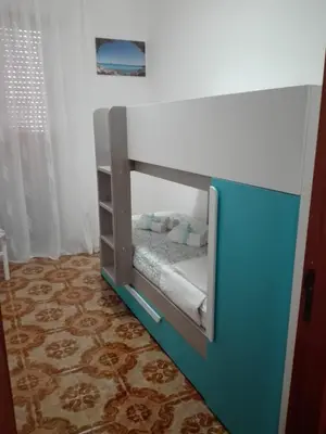 Letto o letti in una camera di Zá ‘Ntunietta