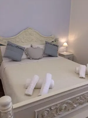Letto o letti in una camera di Zá ‘Ntunietta