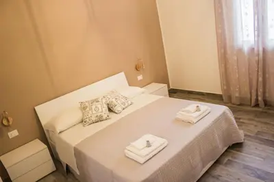 Letto o letti in una camera di Un posto al sole
