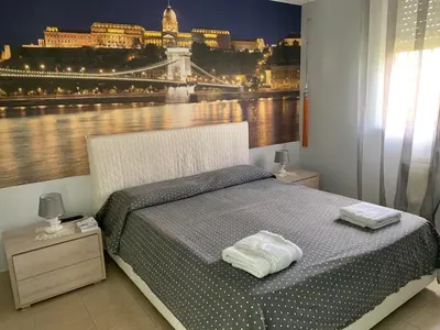 Letto o letti in una camera di Acquamarina Apartment