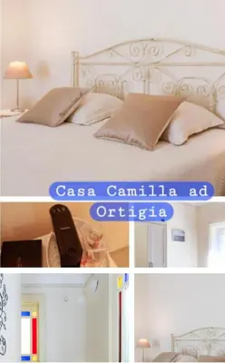 Letto o letti in una camera di Casa Camilla