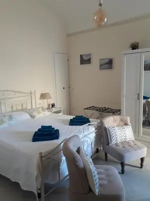 Letto o letti in una camera di Casa Camilla
