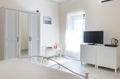 Letto o letti in una camera di Casa Camilla