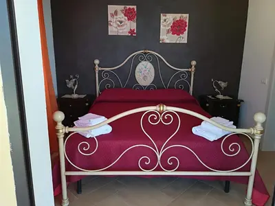 Letto o letti in una camera di Villa Sabbiadoro
