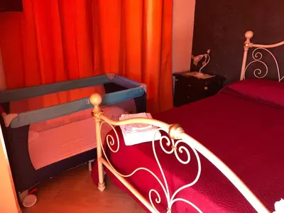 Letto o letti in una camera di Villa Sabbiadoro