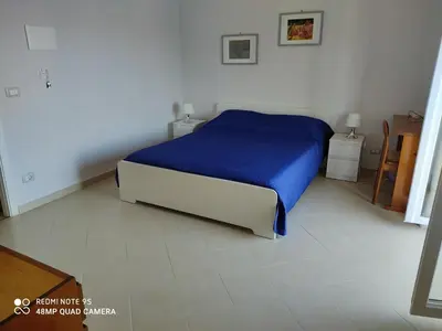 Letto o letti in una camera di Amuni'