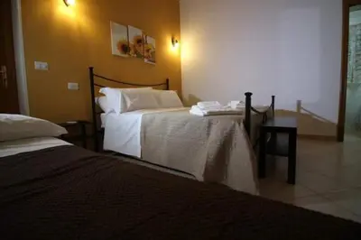 Letto o letti in una camera di Casa Antica