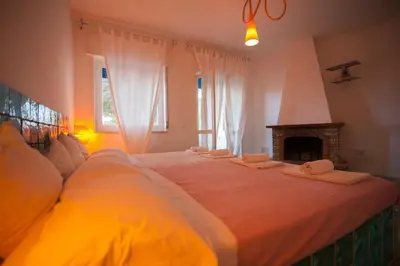 Letto o letti in una camera di Suite House L'Isola Che Non C'è