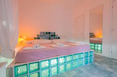 Letto o letti in una camera di Suite House L'Isola Che Non C'è