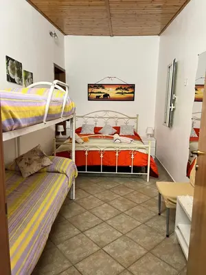 Letto o letti in una camera di Marzamemi infinity Sun