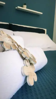 Letto o letti in una camera di Isola Blu
