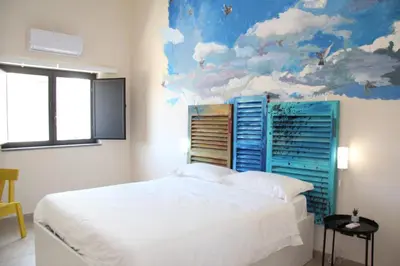 Letto o letti in una camera di Urban Pop Bnb