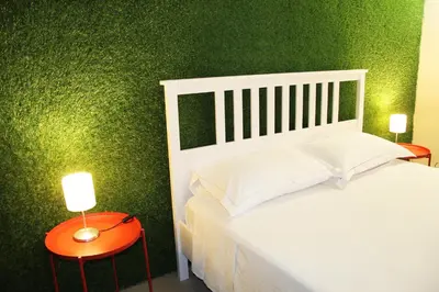 Letto o letti in una camera di Urban Pop Bnb