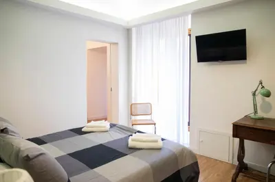 Letto o letti in una camera di Uzeda Inn Apartment