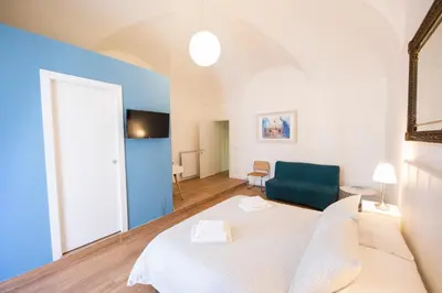 Letto o letti in una camera di Uzeda Inn Apartment