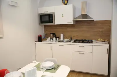 Cucina o angolo cottura di Uzeda Inn Apartment