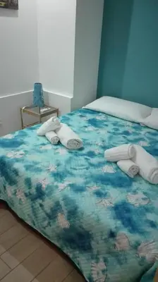 Letto o letti in una camera di Smile's Home