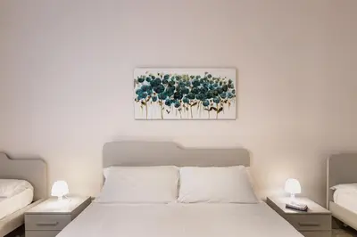 Letto o letti in una camera di Nonna Nina