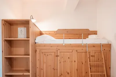 Letto o letti in una camera di Villa Gioielli