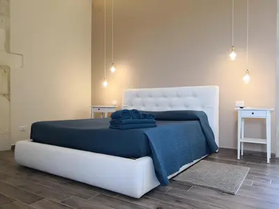 Letto o letti in una camera di Masseria Case Damma