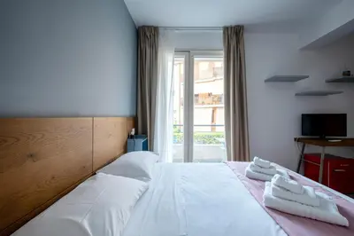 Letto o letti in una camera di Serafini Rooms