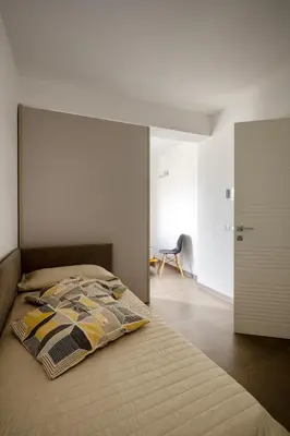 Letto o letti in una camera di Serafini Rooms