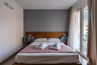 Letto o letti in una camera di Serafini Rooms