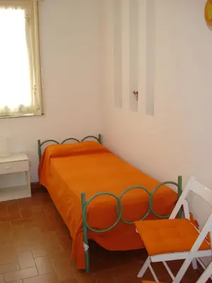 Letto o letti in una camera di Villa La Bussola