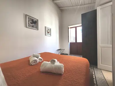 Letto o letti in una camera di Casa Beasol