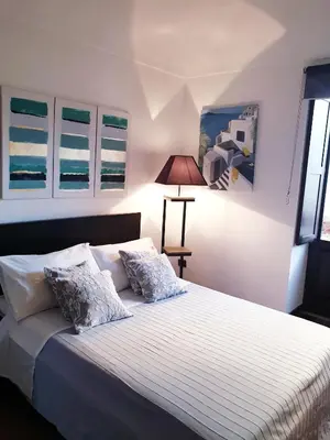 Letto o letti in una camera di Dimora Montalto,indipendente con terrazzo privato