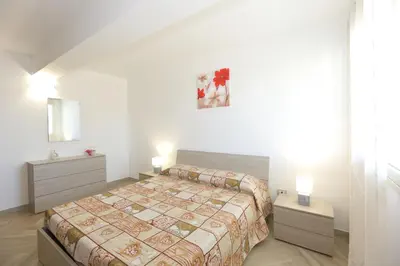 Letto o letti in una camera di Villetta Giorgia