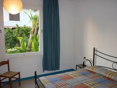 Letto o letti in una camera di Baia Arcile Case Vacanza