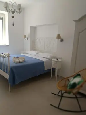 Letto o letti in una camera di Fuga Blu - Piano terra