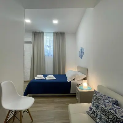 Letto o letti in una camera di La Quercia